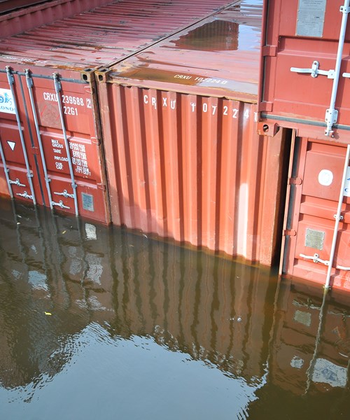 Vessel containers submerged in water