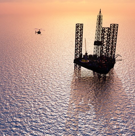 An image of an oil and gas platform in the ocean