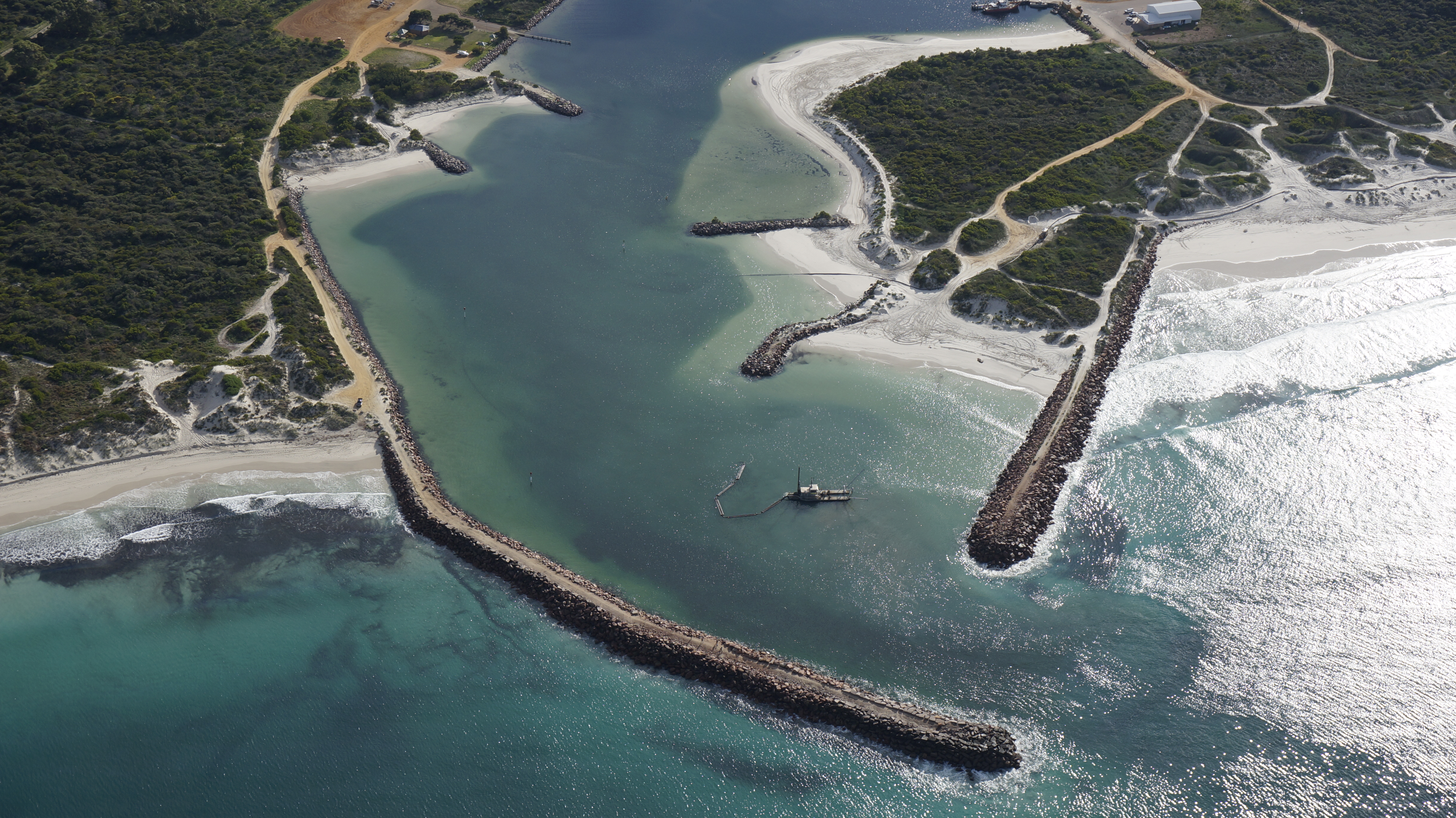 An aerial view of the entrance to a port