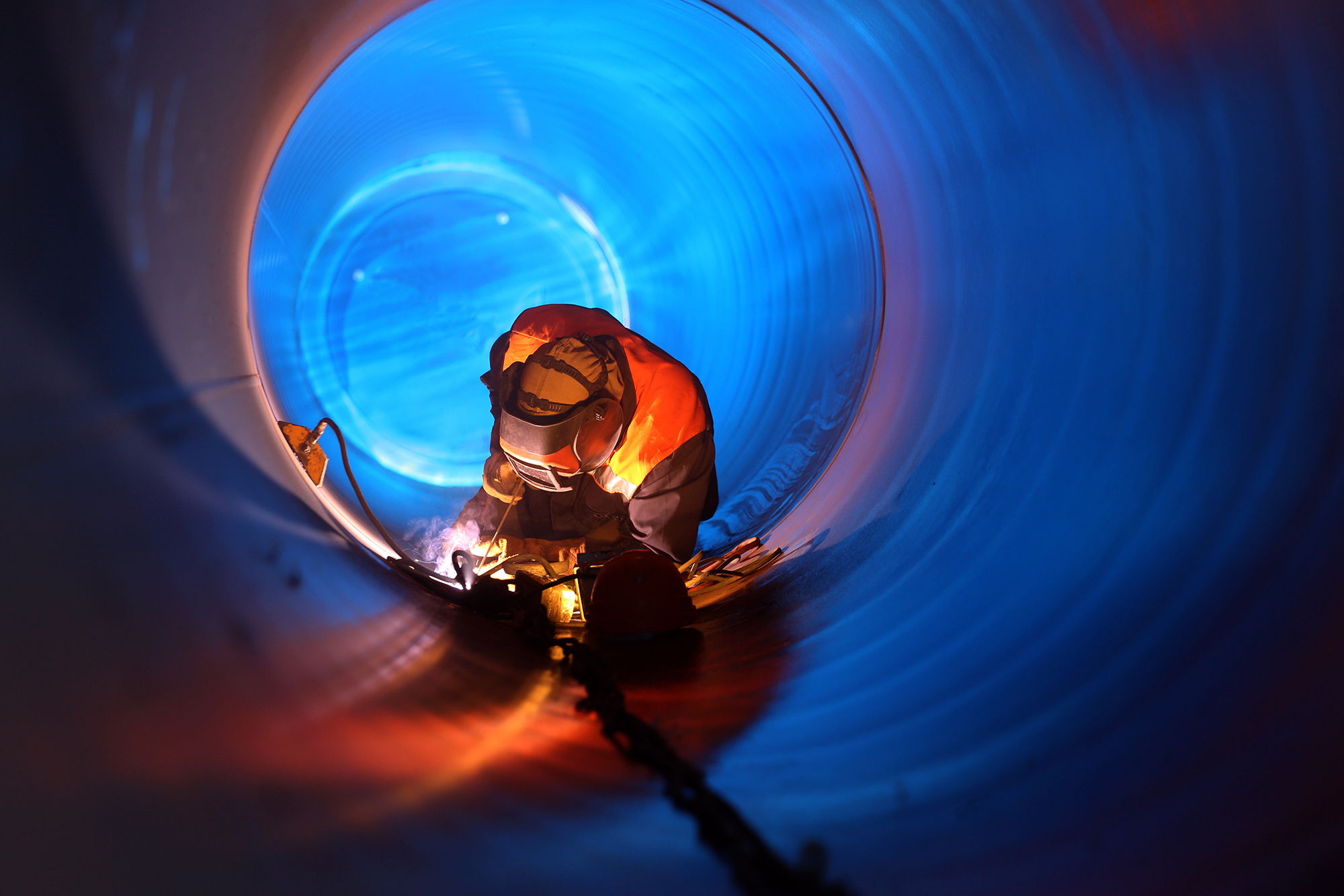 worker inside pipe