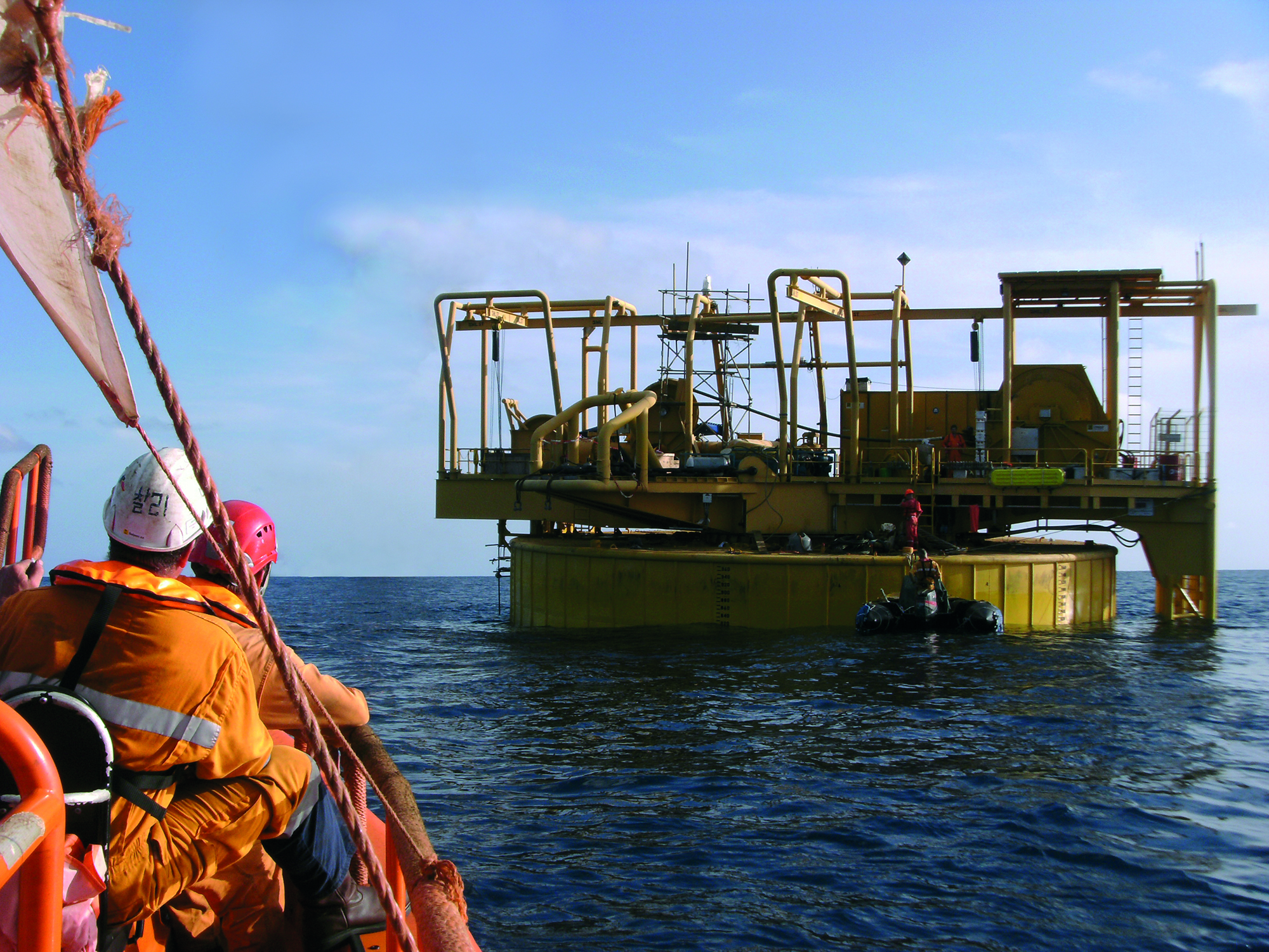 An image of a vessel approaching a single point mooring system at sea