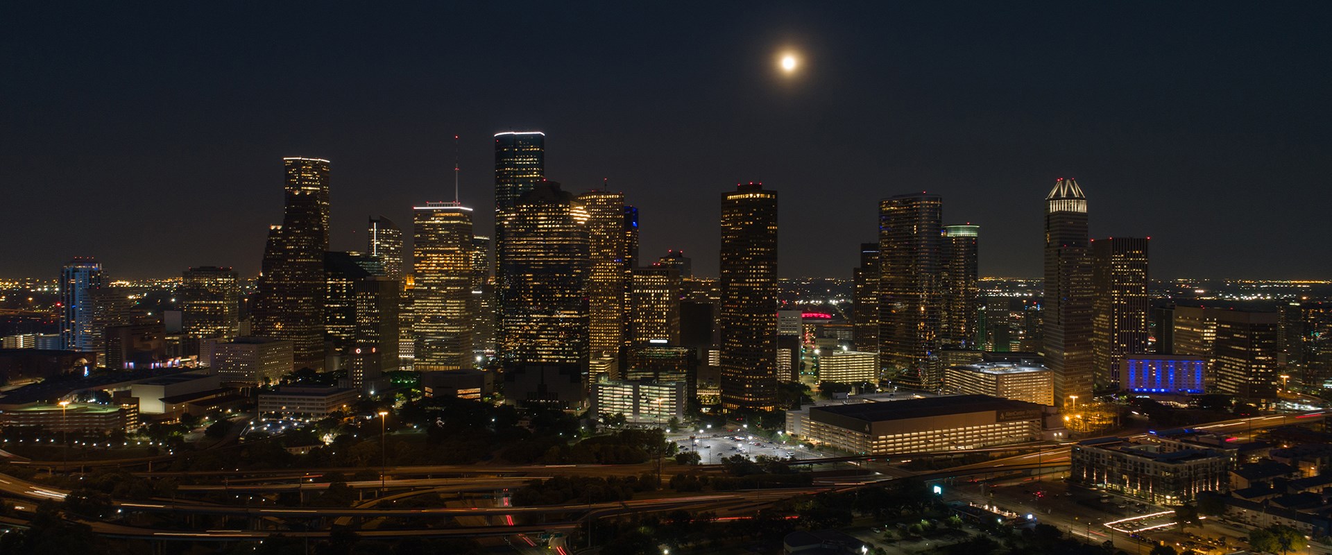 Skyline of Houston Texas at night with skyscrapers in background