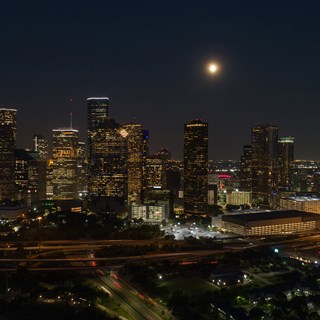 Skyline of Houston Texas at night with skyscrapers in background