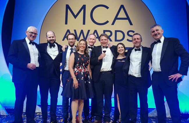 The BMT project teams on stage at the MCA Awards 2023