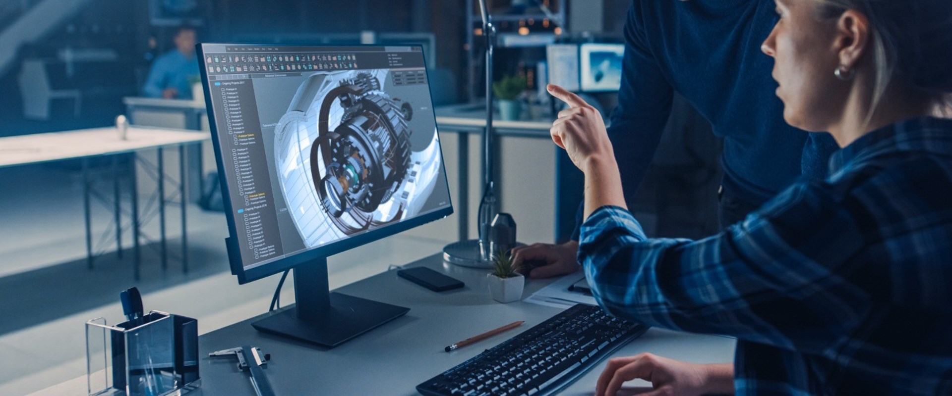 Data engineers looking at a screen.