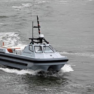 The ARCIMS unmanned surface vessel (USV) in operational mode, demonstrating its advanced autonomous capabilities in dynamic maritime environments.